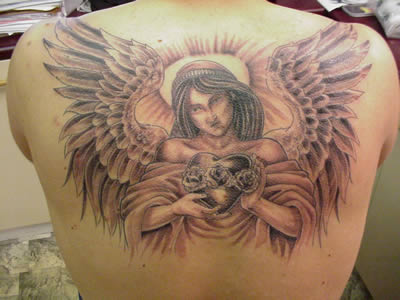 http://s4.picofile.com/file/7751684301/angel_tattoo_design2.jpg