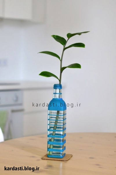 گلدان زیبا با بطری شیشه